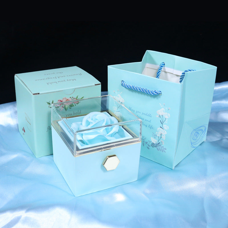 Give a romantic surprise with this creative rotating rose soap-flower gift box, complete with a jewelry compartment—perfect for Valentine’s Day.