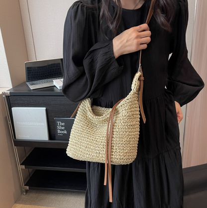 The new U shaped paper rope one shoulder oblique span straw woven bag women bag all match casual dumpling shaped leather strip