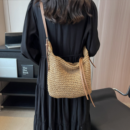 The new U shaped paper rope one shoulder oblique span straw woven bag women bag all match casual dumpling shaped leather strip