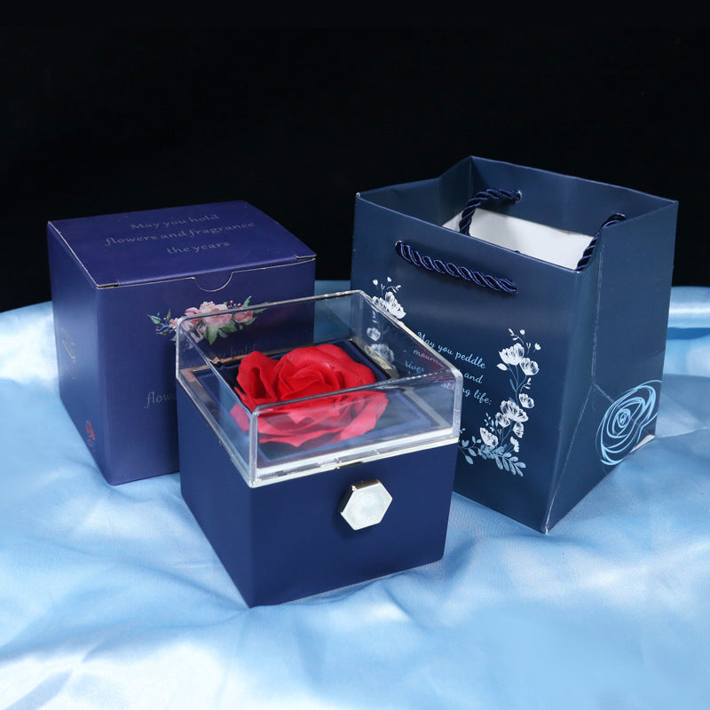 Give a romantic surprise with this creative rotating rose soap-flower gift box, complete with a jewelry compartment—perfect for Valentine’s Day.