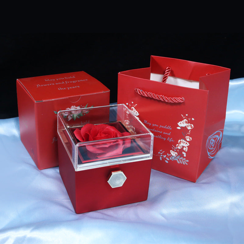 Give a romantic surprise with this creative rotating rose soap-flower gift box, complete with a jewelry compartment—perfect for Valentine’s Day.