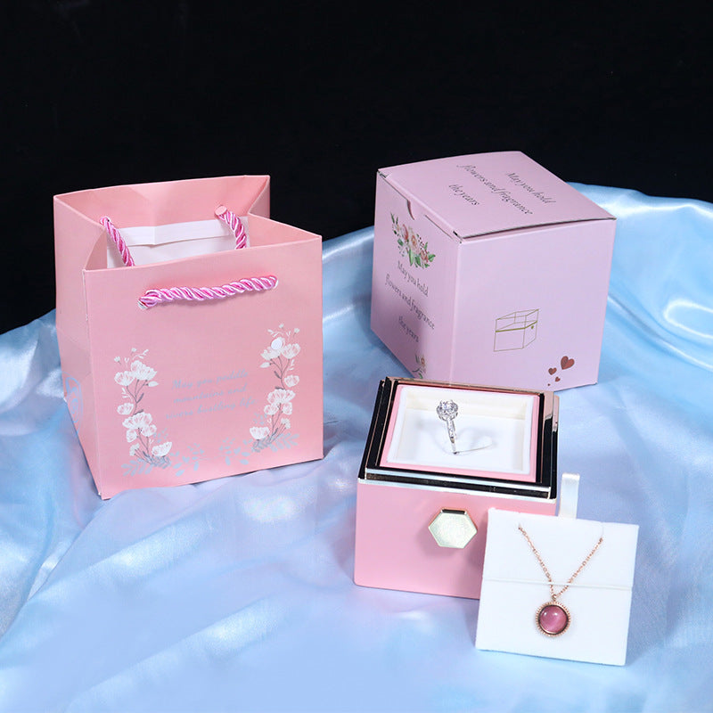 Give a romantic surprise with this creative rotating rose soap-flower gift box, complete with a jewelry compartment—perfect for Valentine’s Day.