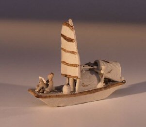 Man on Sampan Boat  Unglazed Figurine