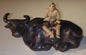Ceramic Figure Man Sitting On Sitting Buffalo Large
