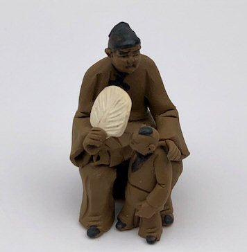 Ceramaic Figurine  Mom & Son Sitting On A Bench - 2.25"