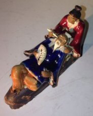 Ceramic Figurine Man & Woman Relaxing On A Bench