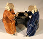 Ceramic Figurine Two Men Sitting On A Bench Playing Chess - 2.0" Color: Orange & Blue