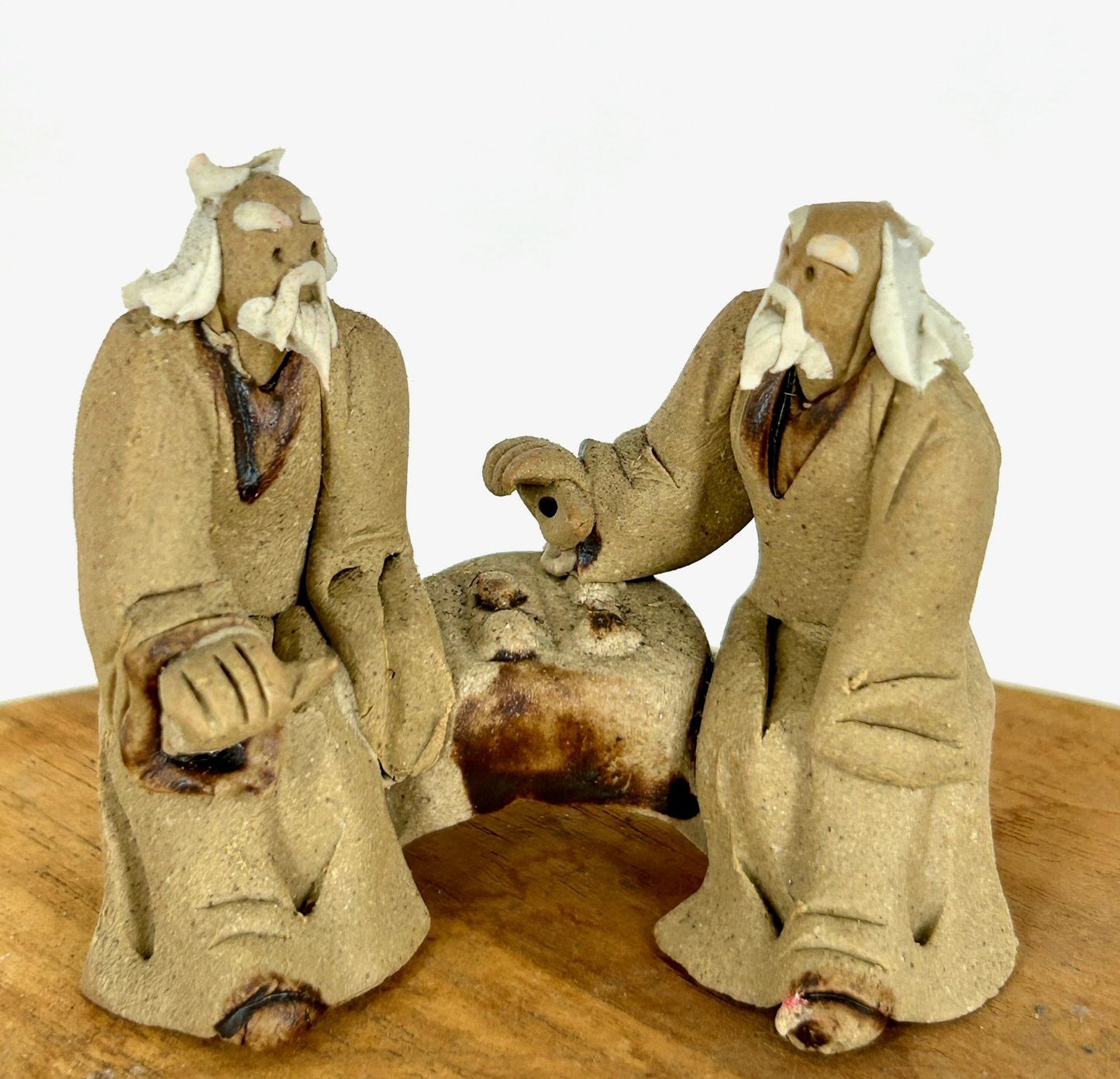 Ceramic Figurine Two Mud Men Sitting On A Bench Playing Chess 2"