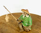 Miniature Ceramic Glazed Fisherman Figurine Light Green 1.25"