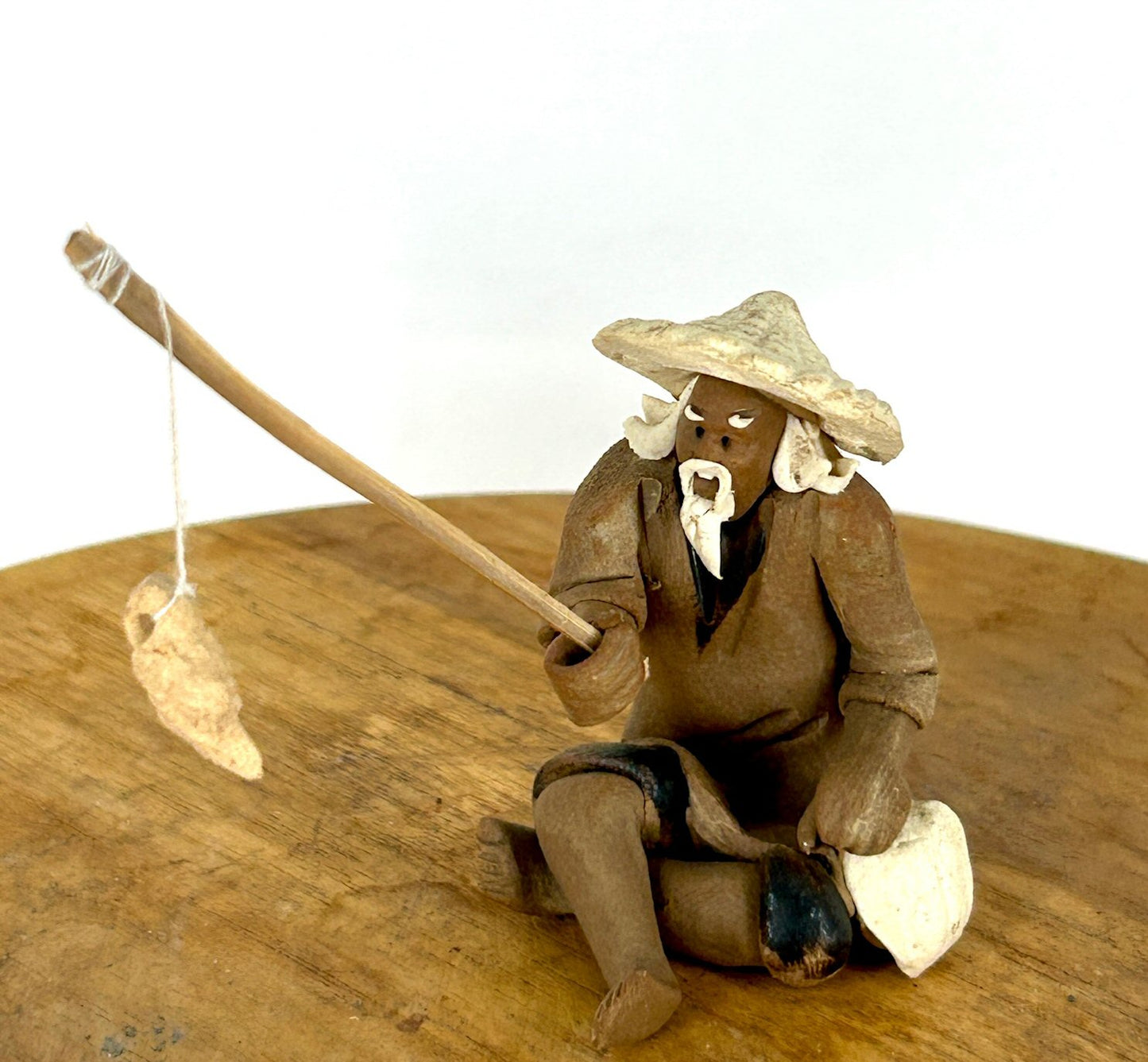 Miniature Ceramic Figurine - Unglazed Fisherman  2.0"