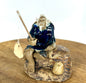 Miniature Ceramic Glazed Fisherman Figurine Sitting On A Log  Blue - 2.5"