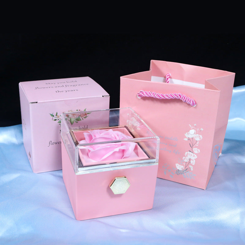 Give a romantic surprise with this creative rotating rose soap-flower gift box, complete with a jewelry compartment—perfect for Valentine’s Day.